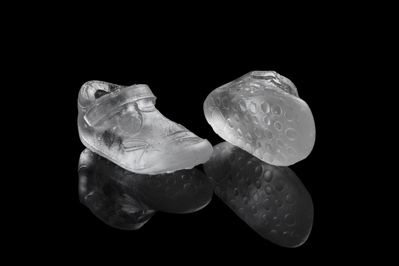 The Memory of what Remains Cast glass clear baby shoes
